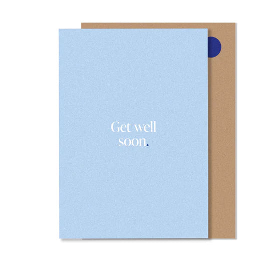 A blue greeting card with the text 'GET WELL SOON' printed in white on the front, accompanied by a small blue circle.