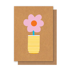 Greeting card with a pink flower and striped vase on a brown background