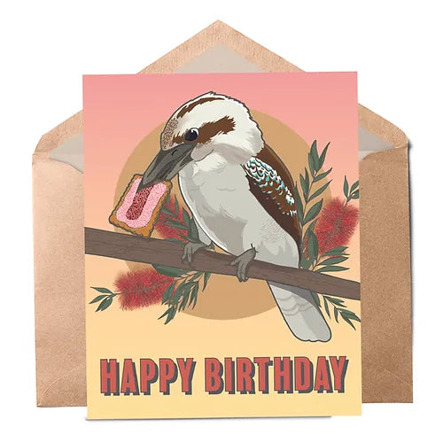 A greeting card with a illustration of a kookaburra with an iced-vovo in its beak sitting on a branch, with the text 'HAPPY BIRTHDAY'.