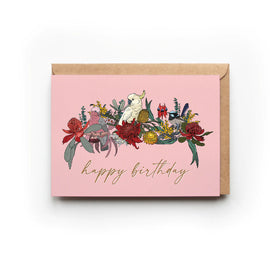 Pink birthday card with floral design and bird illustration on a white background