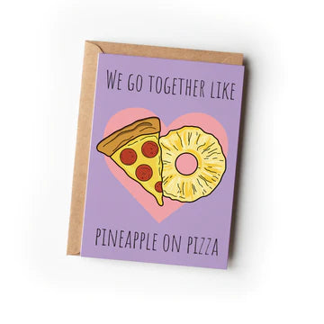 A greeting card with a purple background featuring an illustration of a pineapple and a slice of pizza with the text 'We go together like pineapple on pizza'.