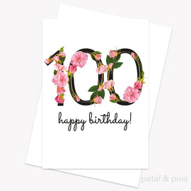100th birthday card with floral design and 'happy birthday!' text on a white background.
