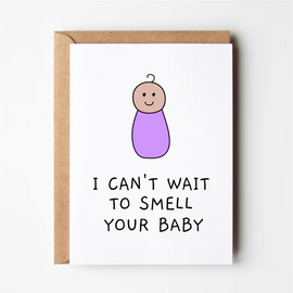 A greeting card with a simple illustration of a baby in purple and the text 'I CAN'T WAIT TO SMELL YOUR BABY'.