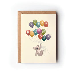 Birthday card with a koala and colorful balloons on a beige background