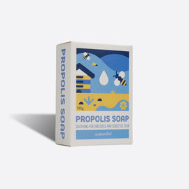 Box of propolis soap with a bee and honeycomb design on a white background