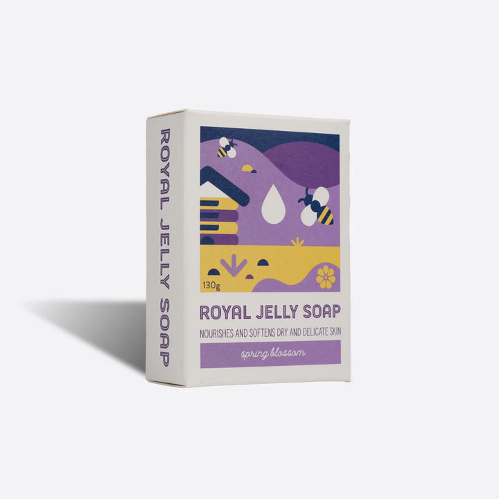 Box of Royal Jelly Soap with bee and flower design on a white background