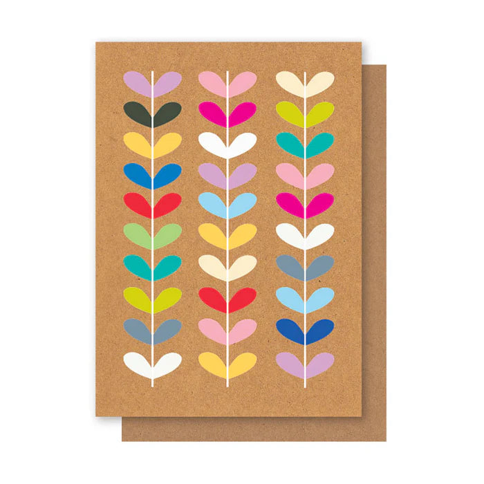 Greeting card with colorful leaf pattern on a brown background
