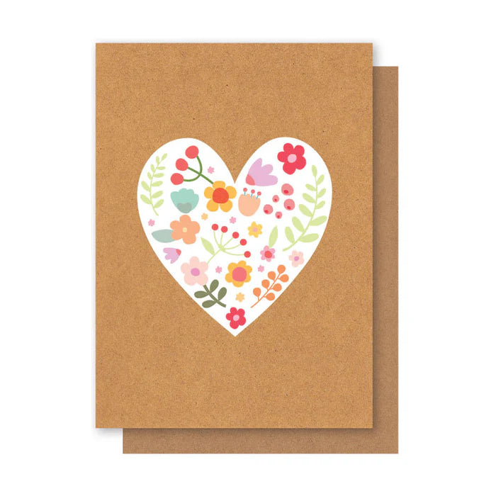 Card with a floral heart design on a brown kraft paper background