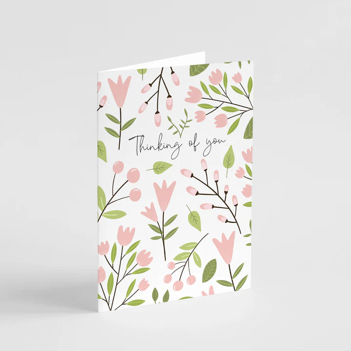 Floral card with 'Thinking of you' text on a light gray background