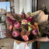 Bouquet of native flowers in an earthy, autumnal colour palette