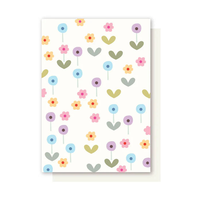 Greeting card with colorful floral pattern on a white background