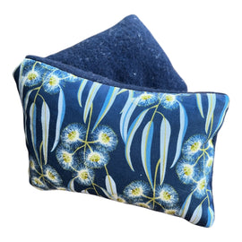Floral patterned fabric heat pack on a white background