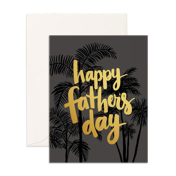 The Smellies Flowers HAPPY FATHER'S DAY GREETING CARD features black palm tree silhouettes on a dark background with bold gold lettering. Includes a white envelope—perfect for your special message to dad.